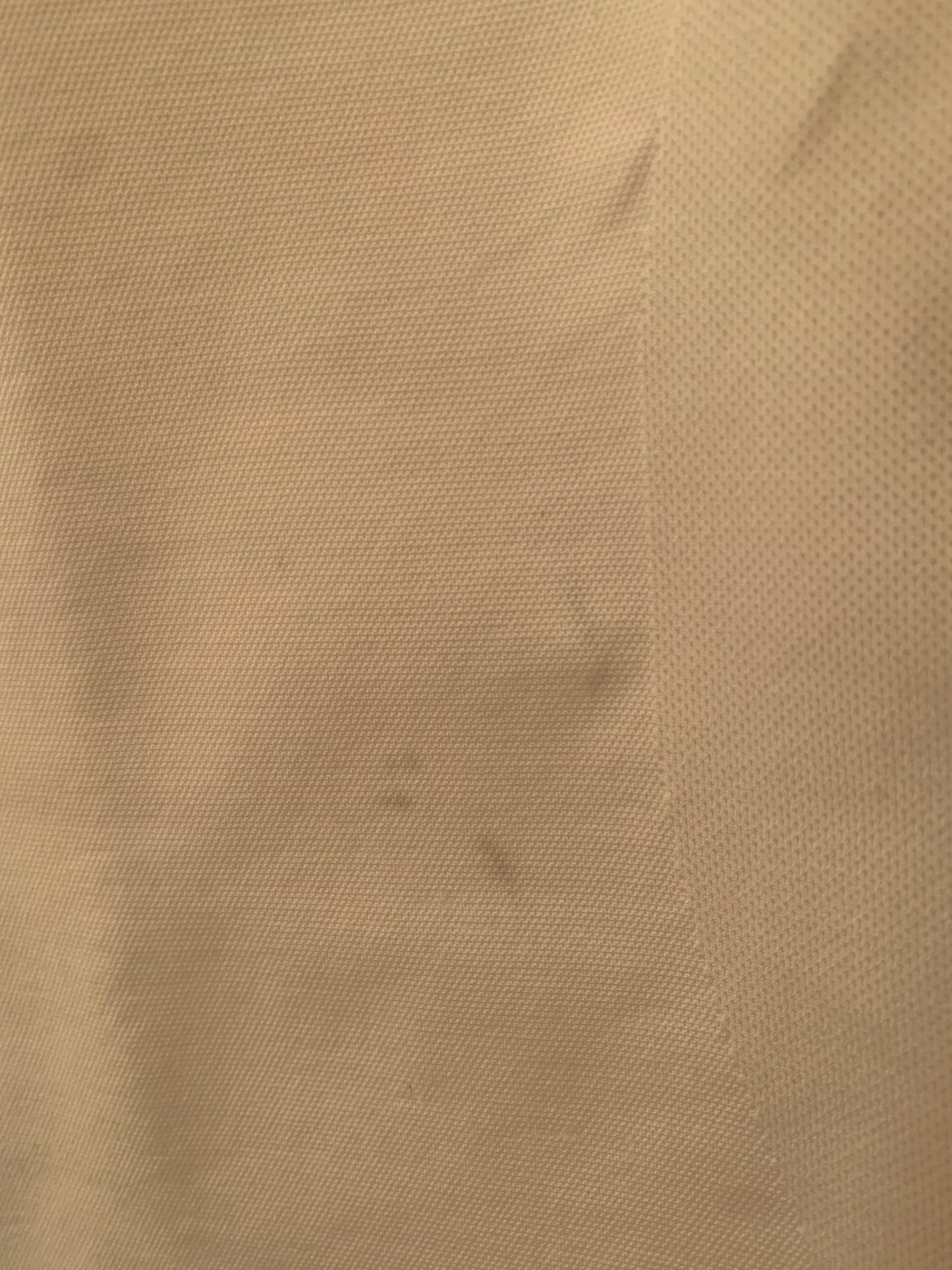 Empetua Compression Tank in Size Large. Close up of stain.