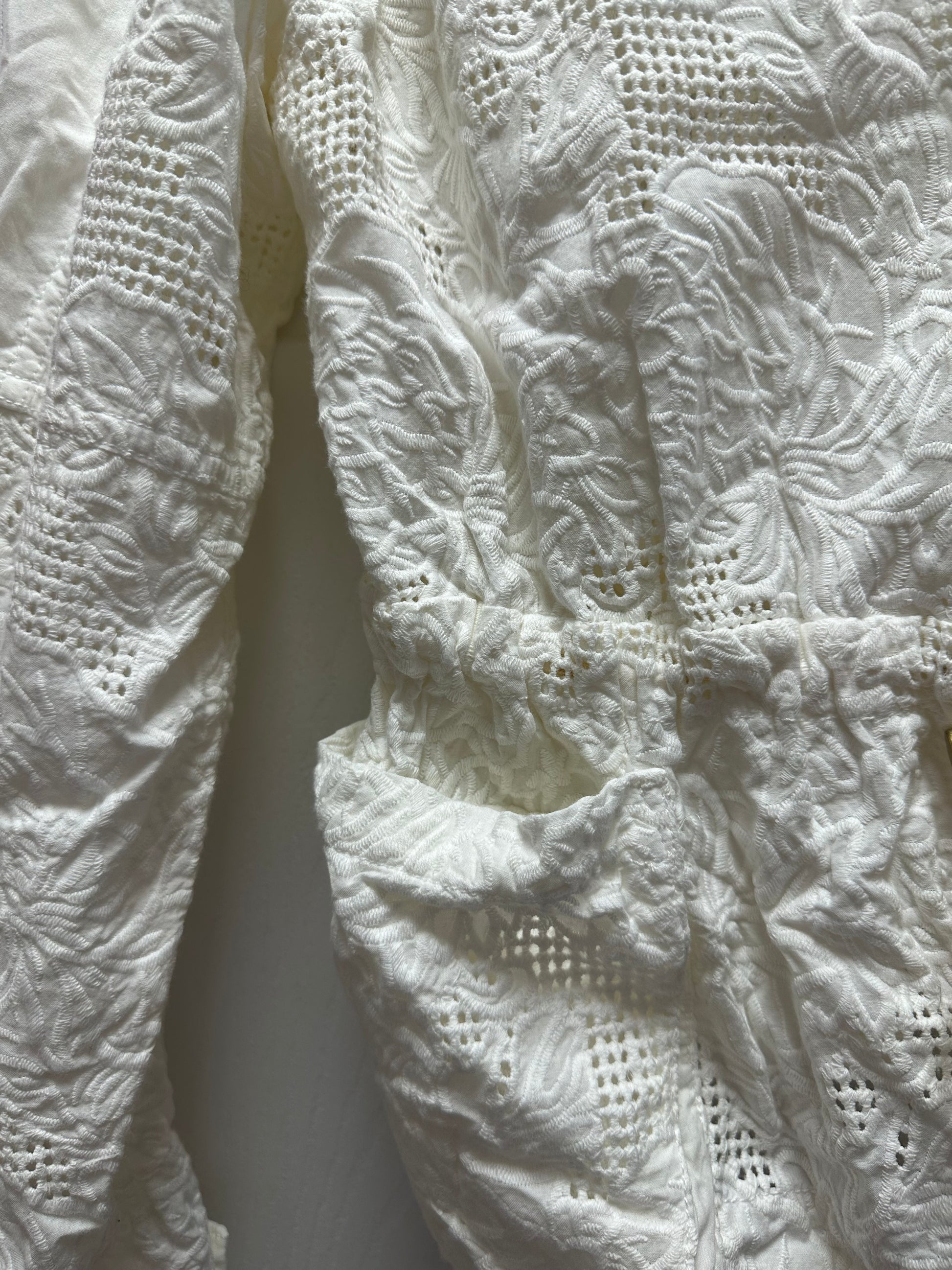 White Lace Anthropologie Jacket in a Size Medium with long sleeves