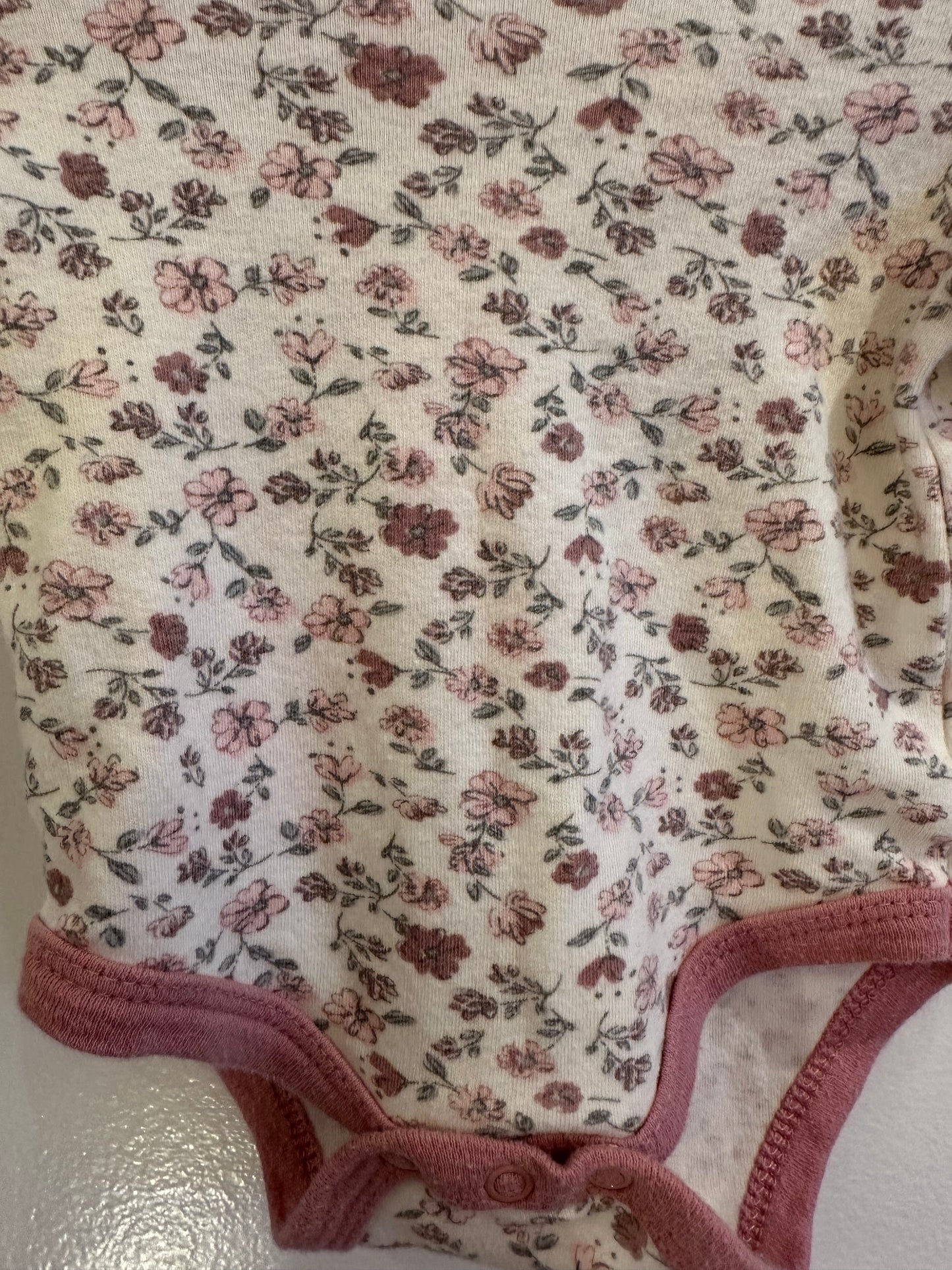 Baby Flower Onesie with pink trim